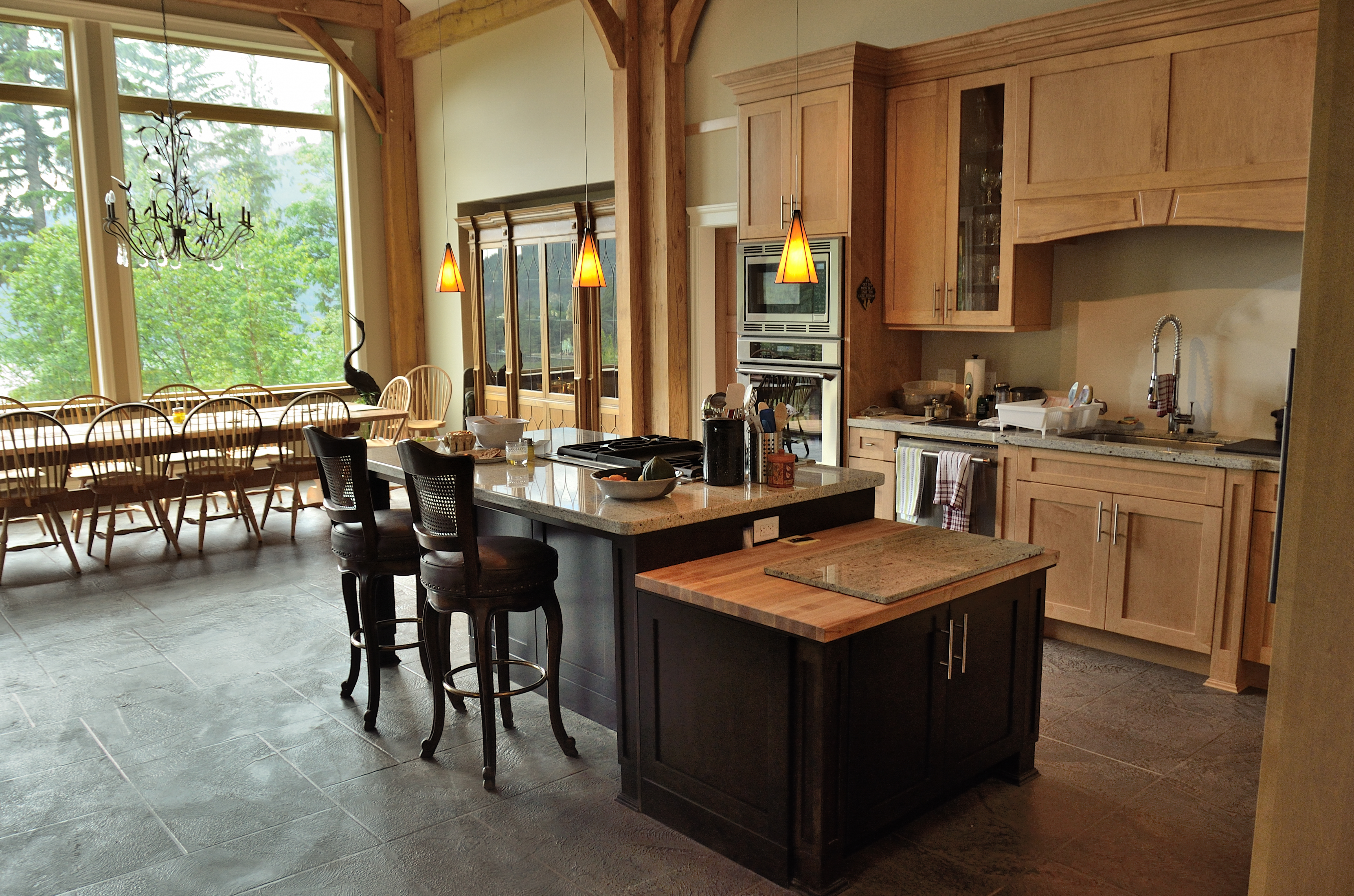 Timber-frame kitchen with slate-look floor