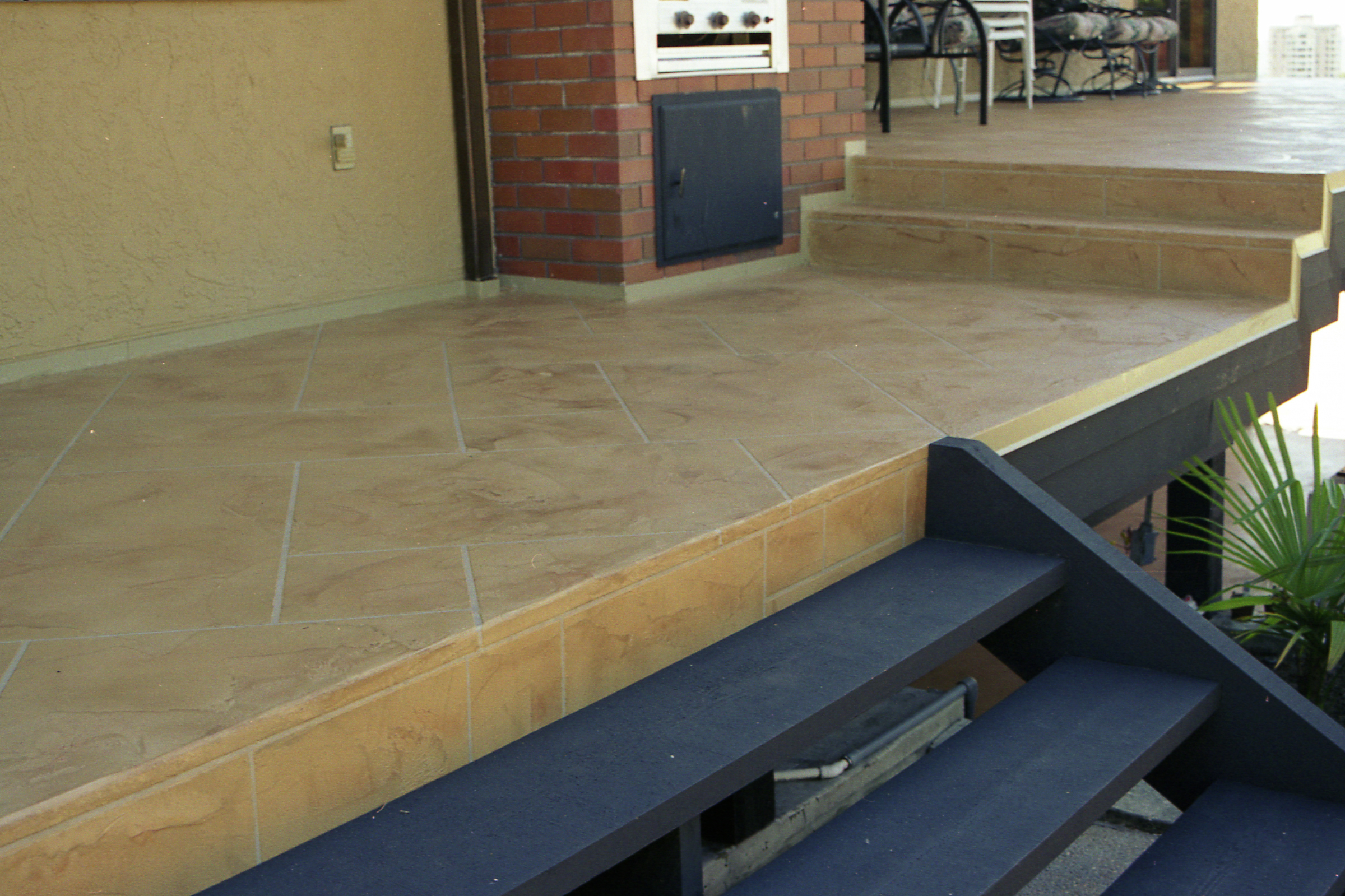Patio with sandstone tile and BBQ area
