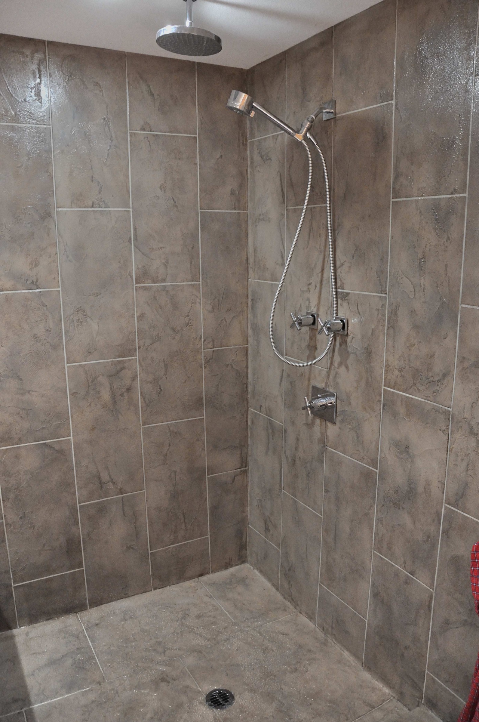 StoneCraft walk-in shower with non-porous anti-mold surface