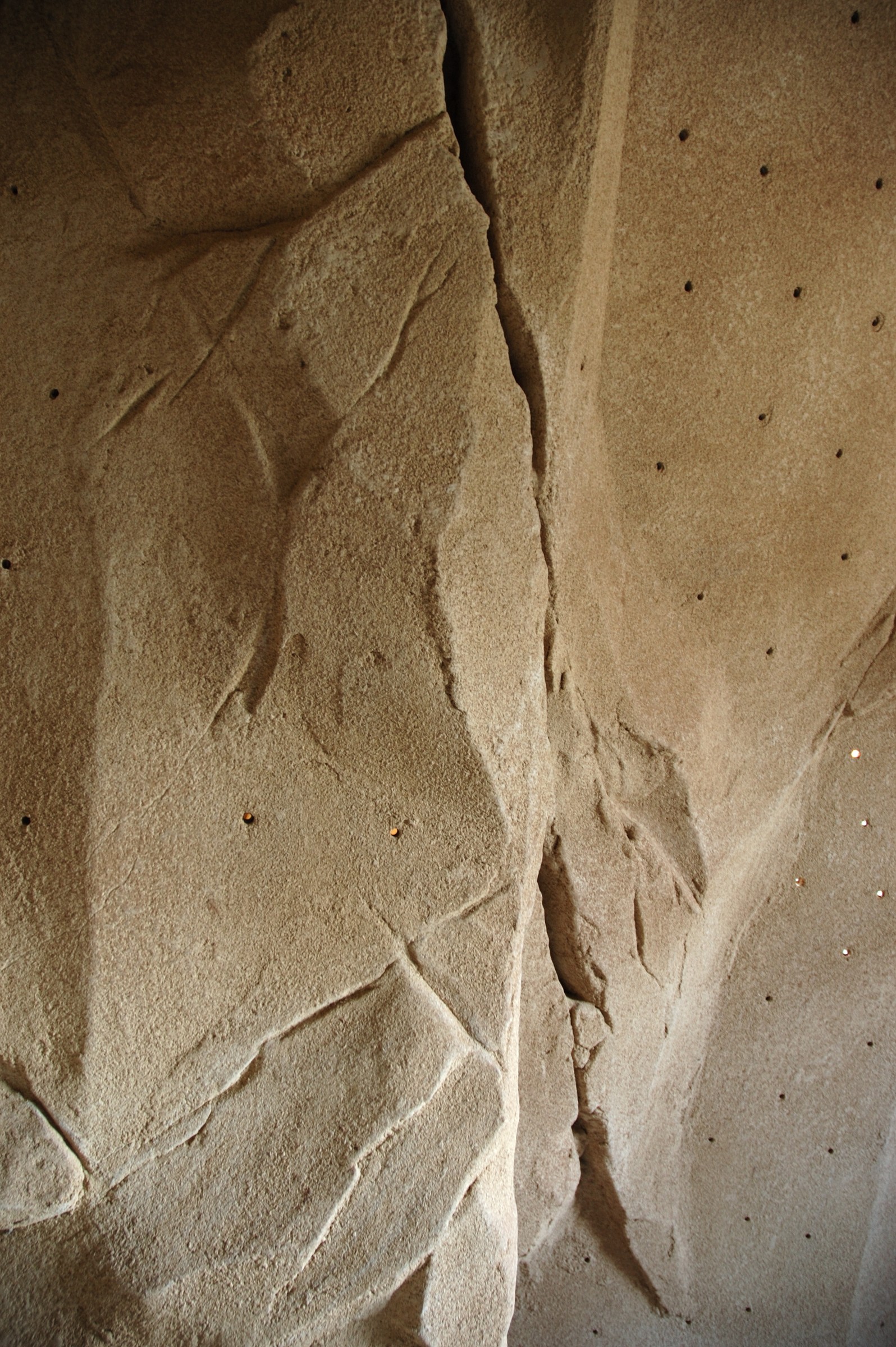 StoneCraft bouldering wall with sculpted crack and overhang features