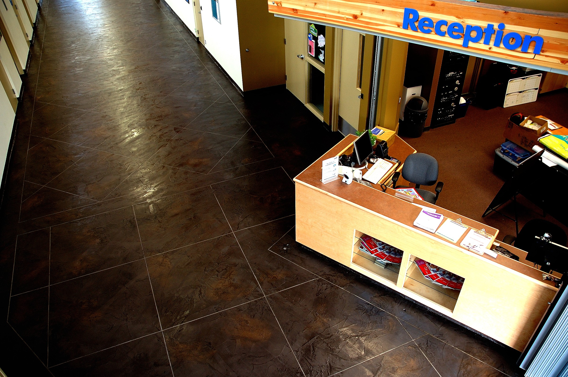 Commercial space reception area with StoneCraft floor viewed from above