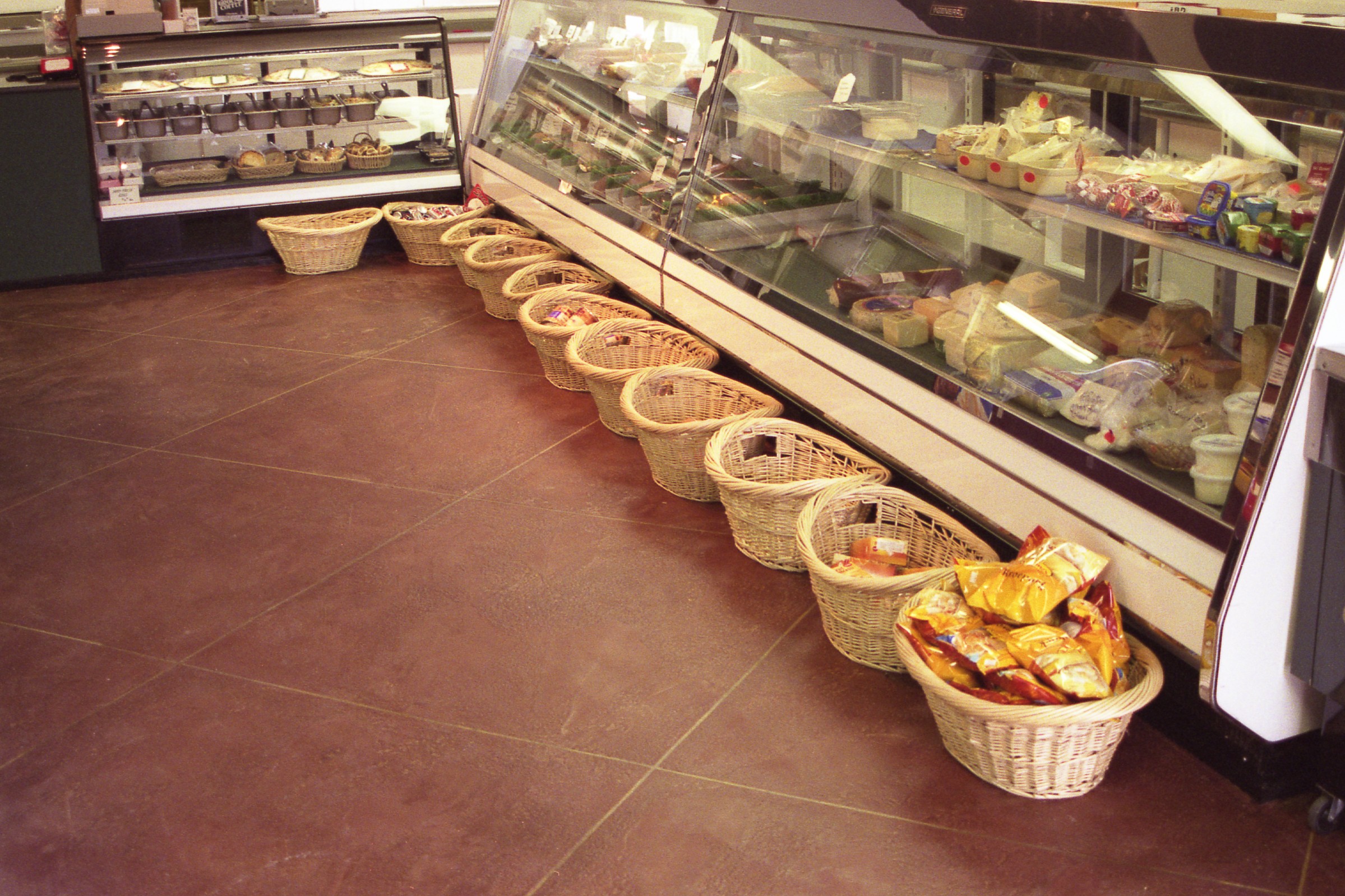 Upscale retail store with warm StoneCraft tile flooring