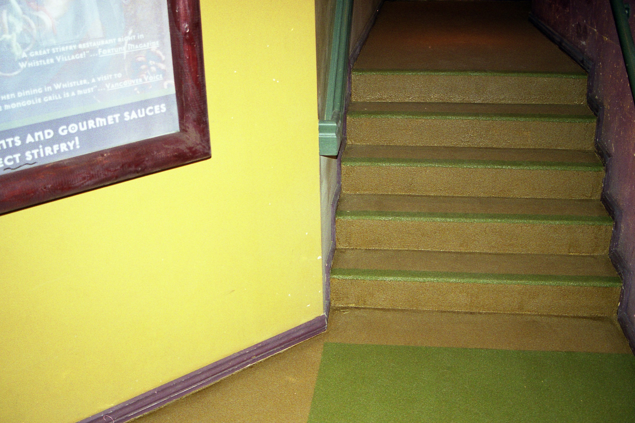 StoneCraft Quartz anti-slip flooring on industrial stairwell with metal railings