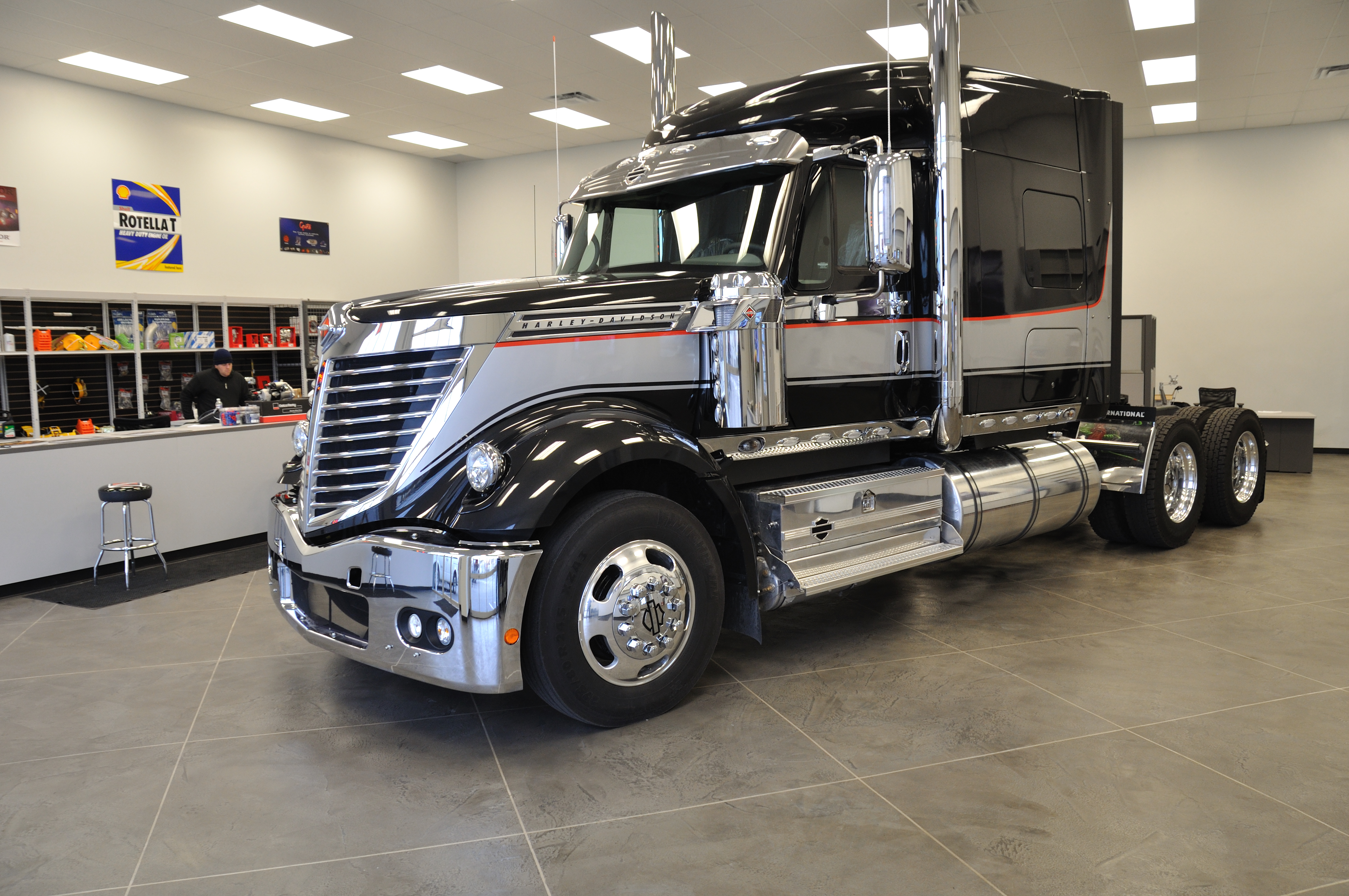 Truck dealership showroom with grey StoneCraft slate flooring