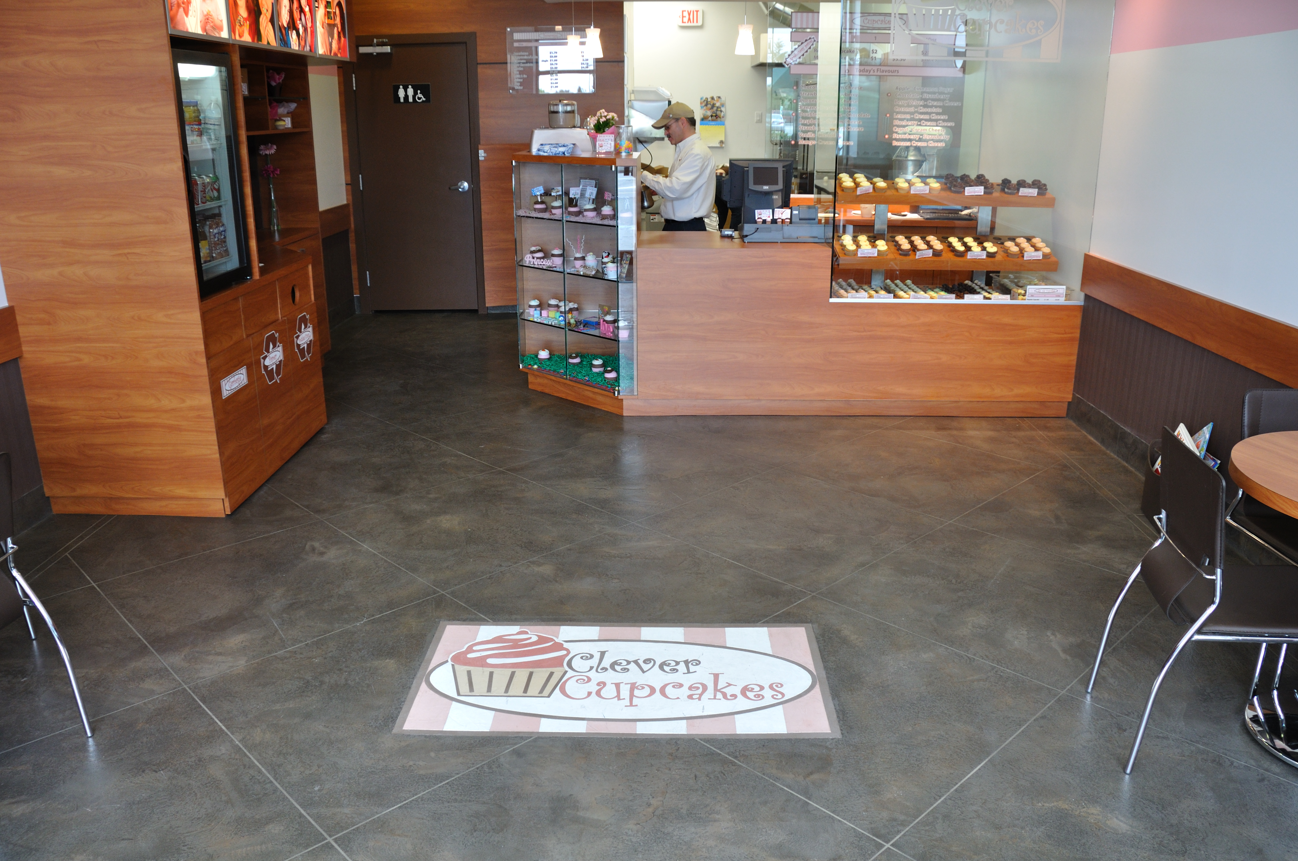 Bakery with custom Clever Cupcakes logo inlaid in StoneCraft floor