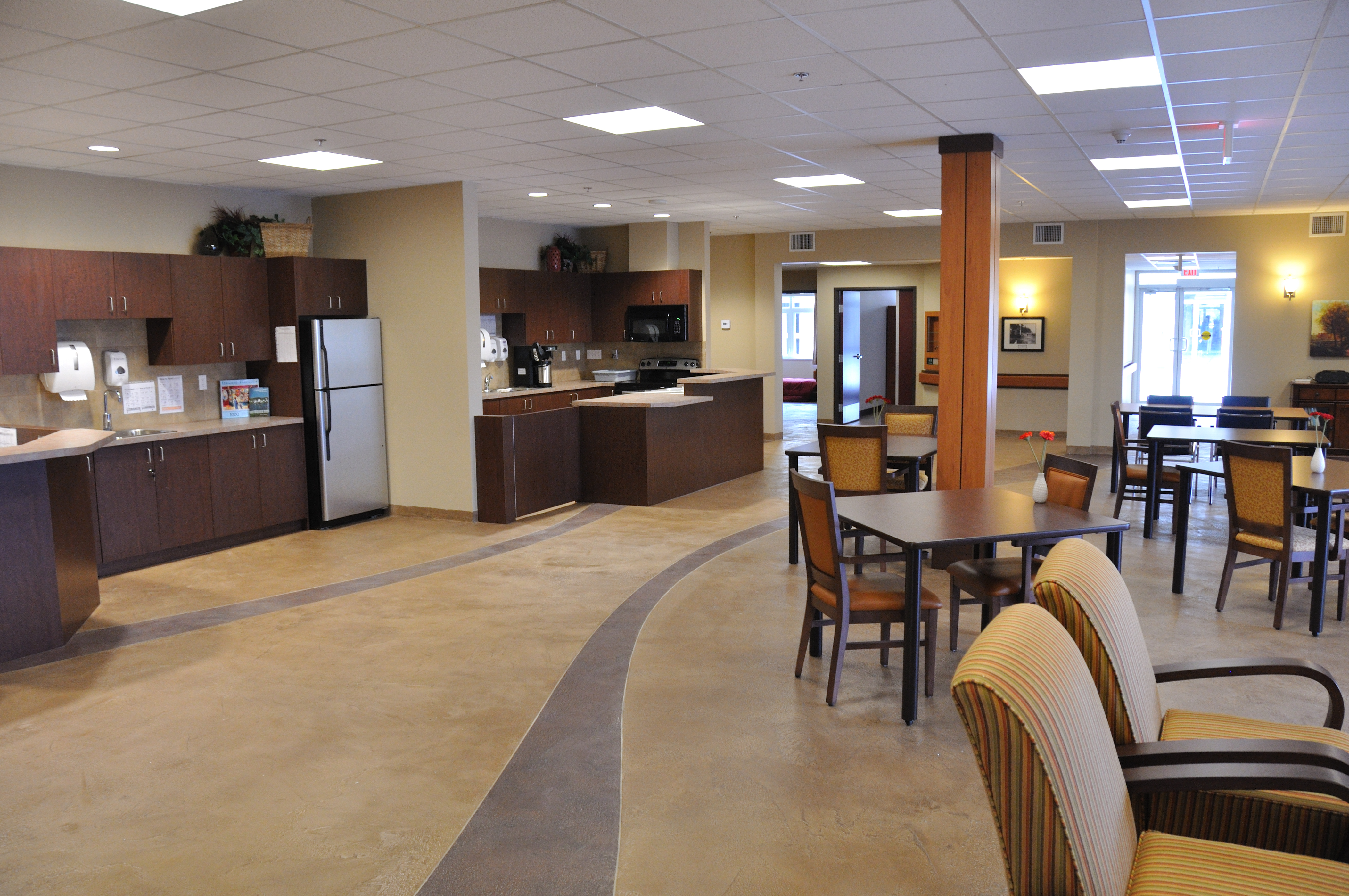 Care facility dining hall with curved-accent StoneCraft flooring