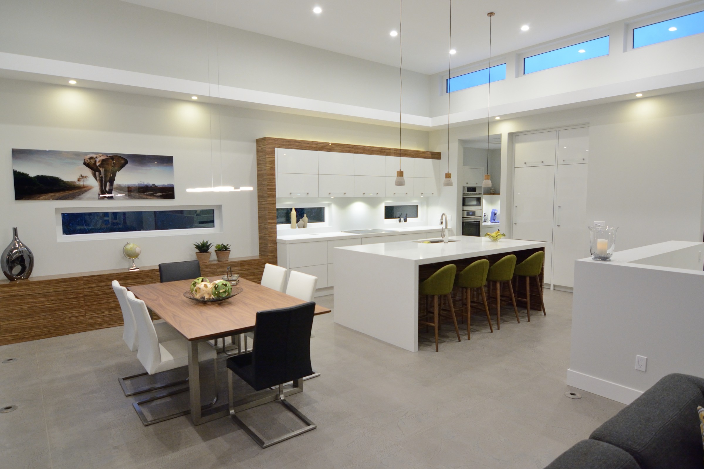 Open concept kitchen and dining with seamless StoneCraft flooring